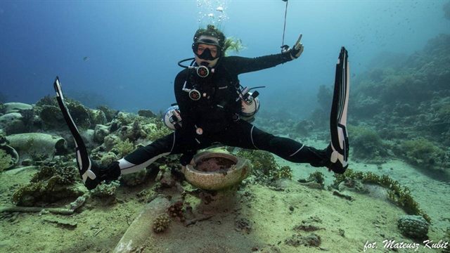 On the sand between the corals